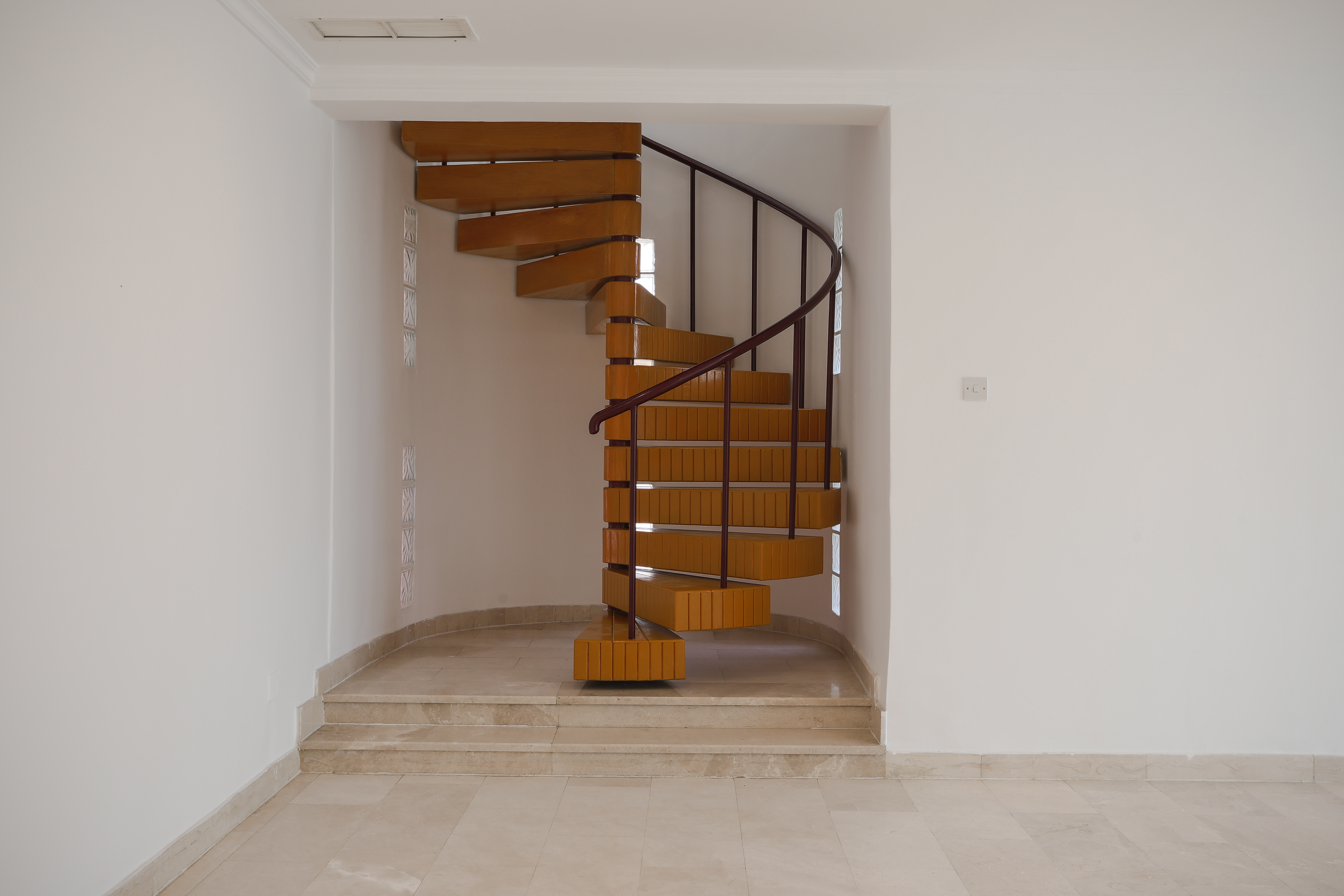 Stylish Spiral Staircase in the Apartment